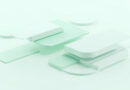 Formas geometricas apiladas en tonos menta representando ventanas de escritorio